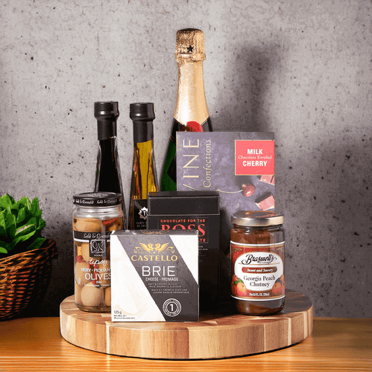 "Joyful Snacking Sparkling Wine Gift Basket" A special gift for someone special, boasts deliciously luxurious delicacies and a bottle of bubbly.